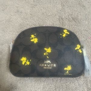 coach x peanuts mini serena brown black signature canvas woodstock crossbody bag